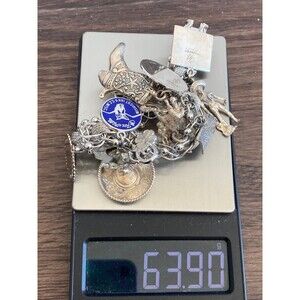 63.9g Super heavy Vintage sterling silver cowboy Charm Bracelet